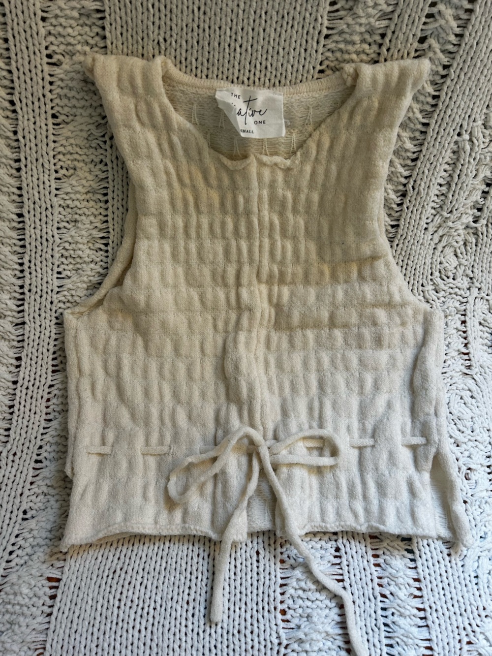 The Native One Cream Textured Knit Cropped Sleeveless Sweater with Waist Tie